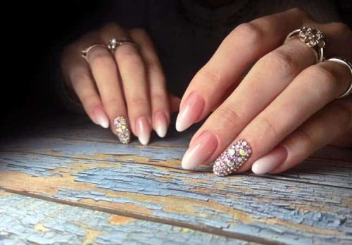 Female hands with beautiful nail polish.